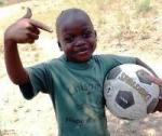 smiling boy with a football